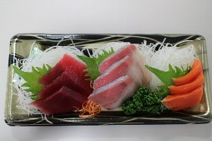 Platter of sashimi before freezing.