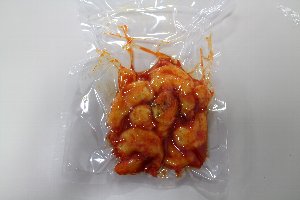 Vacuum packed Shrimp with chili sauce.