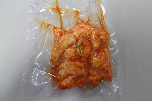 Shrimp with chili sauce that removed from liquid freezer.
